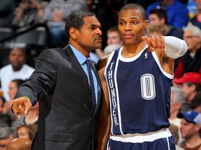 Oklahoma City assistant coach Maurice Cheeks, left, talks with Russell Westbrook during a time out against the Denver Nuggets at the Pepsi Center this year. (Photo by Doug Pensinger/Getty Images)