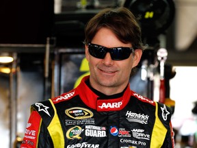 Jeff Gordon, driver of the #24 Drive To End Hunger Chevrolet, stands in the garage during practice for the NASCAR Sprint Cup Series Coca-Cola 600 at Charlotte Motor Speedway in Concord, North Carolina. (Photo by Jeff Zelevansky/Getty Images)