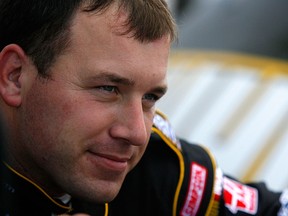 Ryan Newman, driver of the #39 U.S. Army Chevrolet, waits in the garage area during practice for the NASCAR Sprint Cup Series Daytona 500 at Daytona International Speedway. (Photo by Jason Smith/Getty Images for NASCAR)