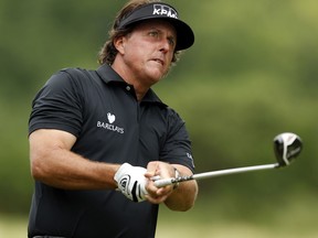 Phil Mickelson watches his tee shot on the second hole during the first round of the 113th U.S. Open at Merion Golf Club in Ardmore, Pennsylvania. (Photo by Scott Halleran/Getty Images)