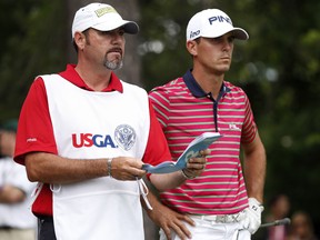 Billy Horschel, right, waits on the 16th tee with caddie Micah Fugitt during Round 2 of the 113th U.S. Open at Merion Golf Club in Ardmore, Pennsylvania.  (Photo by Scott Halleran/Getty Images)