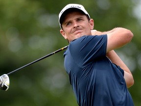 Justin Rose of England hits his tee shot on the third hole during the final round of the 113th U.S. Open at Merion Golf Club Sunday in Ardmore, Pennsylvania.  (Photo by Ross Kinnaird/Getty Images)