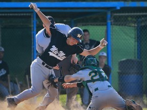 LaSalle Titans catcher Kyle Pearce, right, tags out Windsor Mic Mac baserunner Casey Boutette at home plate during baseball action between the LaSalle Titans U16 team and the Windsor Mic Mac U18 team. (JASON KRYK/The Windsor Star)