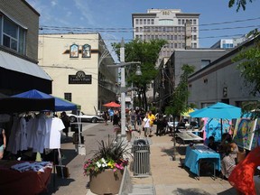 The Alley Art Show and Sale is Sat. July 19 from noon to 9 p.m. and Sun. July 20 from noon to 6 p.m. at Maiden Lane in downtown Windsor. Pictured here is last year's event, Sun. June 23, 2013. (DAX MELMER/The Windsor Star)