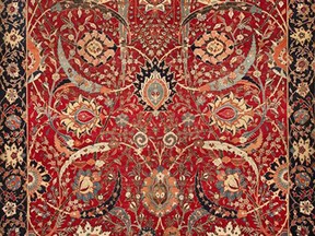 This undated file photo provided by Sotheby's shows a Sickle-Leaf Carpet, a Persian rug from Washington, D.C.’s Corcoran Gallery of Art, that was auctioned in New York on Wednesday, June 5, 2013 by Sotheby's. Sotheby's says it sold for $33.7 million, more than three times the previous auction record for a carpet. (AP Photo/Sotheby's, File)