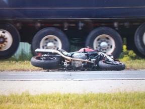 A motorcyclist is lucky to be alive following a collision on E.C. Row Expressway on June 18, 2013. (Jason Kryk/The Windsor Star)