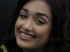 In this Dec. 19, 2008 file photo, Bollywood actress Jia Khan smiles during a promotional event of her forthcoming Hindi movie 'Ghajini' in Bangalore, India. Police said that Khan was found dead at her home in Mumbai late Monday, June 3, 2013. Khan began her career in Mumbai's film industry in the 2007 Hindi film "Nishabd" in which she portrayed a teenager in love with her best friend's father, played by Bollywood superstar Amitabh Bachchan. (AP Photo/Aijaz Rahi, file)