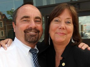 Retiring Director of Education Warren Kennedy, left, introduces the new Director of Education of Greater Essex County District School Board, Erin Kelly, at the board's Park Street West offices Thursday June 27, 2013. (NICK BRANCACCIO/The Windsor Star)