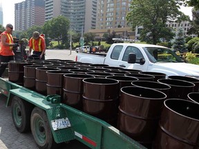 In this file photo, dozens of garbage barrels are placed on the Windsor riverfront by City of Windsor, in preparation of Ford Fireworks presented by Target Monday June 24, 2013.  (NICK BRANCACCIO/The Windsor Star)