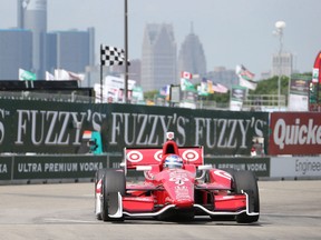 IndyCar driver Scott Dixon takes Turn 2 during a practice session for the Detroit Grand Prix auto race on Belle Isle Friday. (AP Photo/Carlos Osorio)