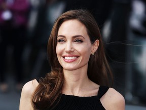 Angelina Jolie attends the World Premiere of 'World War Z' at The Empire Cinema on June 2, 2013 in London, England. (Photo by Tim P. Whitby/Getty Images) O