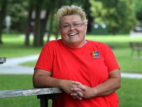 Kym Kell of Forest Glade in Windsor, Ont., is happy about the recent ruling on gay marriage in California, Wednesday June 26, 2013. (NICK BRANCACCIO/The Windsor Star)