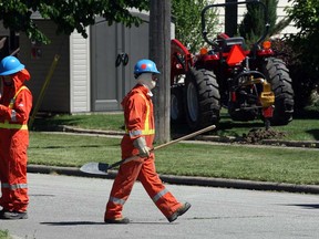 Union Gas, Windsor firefighters and Windsor police were on the scene on Wellesley Street near Ypres Boulevard where a work crew using a power auger struck a gas line Monday, May 3, 2013. Traffic was diverted while crews were called in to repair the line. (NICK BRANCACCIO/The Windsor Star)
