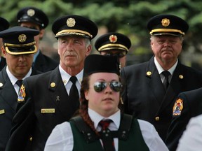 Windsor Fire Chief Bruce Montone takes part in the Fallen Firefighters Memorial March at St. Alphonse Cemetery, Sunday, June 9, 2013.  (DAX MELMER/The Windsor Star)