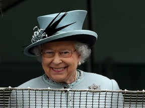 Queen Elizabeth II looks on during The Derby Festival at The Derby Festival at Epsom Racecourse on June 1, 2013 in Epsom, England.  (Photo by Warren Little/Getty Images)