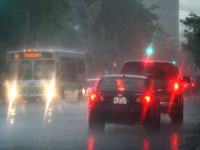 In this file photo, rain beats down on Ouellette Avenue Thursday, June 21, 2012, in downtown Windsor, Ont.  (Windsor Star / DAN JANISSE)