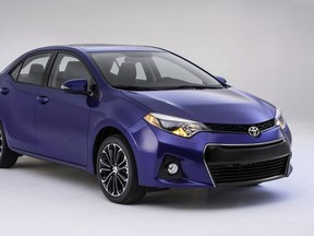 This undated product image provided by Toyota shows the company's new Corolla revealed Thursday, June 6, 2013, in Santa Monica, Calif. The company hopes the new car will shed the old version's low-cost image and attract new, younger buyers to its brand. (AP Photo/Toyota)