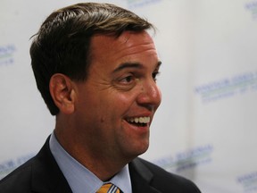 Progressive Conservative Party of Ontario leader, Tim Hudak, speaks with the media after meeting with the Windsor-Essex Regional Chamber of Commerce, Friday, June 14, 2013. (DAX MELMER/The Windsor Star)