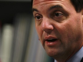 Progressive Conservative Party of Ontario leader, Tim Hudak, speaks with the media after meeting with the Windsor-Essex Regional Chamber of Commerce, Friday, June 14, 2013. (DAX MELMER/The Windsor Star)