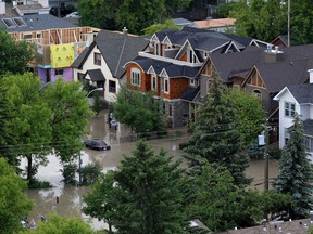 A flooded neighbourhood beside the flooded Bow River in Calgary, Alberta, Canada June 22, 2013. Water levels have dropped slightly today. AFP PHOTO/DAVE BUSTONDAVE BUSTON/AFP/Getty Images