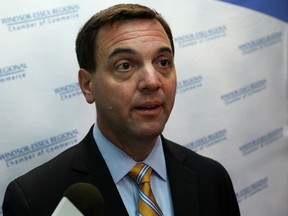 Progressive Conservative Party of Ontario leader, Tim Hudak, speaks with the media after meeting with the Windsor-Essex Regional Chamber of Commerce, Friday, June 14, 2013. (DAX MELMER/The Windsor Star)