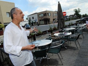 Renato Zavaglia, owner of La Contessa restaurant, is seen on the patio of his restaurant in the area he hopes to put a wood burning pizza over in Windsor on Monday, June 17, 2013. (TYLER BROWNBRIDGE/The Windsor Star)