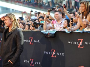 Actor Brad Pitt attends the premiere of "World War Z" in Times Square on Monday, June 17, 2013 in New York. (Photo by Evan Agostini/Invision/AP)