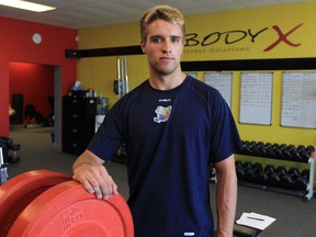 Belle River's Aaron Ekblad takes a break after a workout at Body X Fitness Solutions in Tecumseh. (JASON KRYK/The Windsor Star)