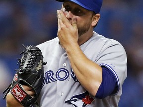 Toronto starting pitcher Mark Buehrle takes a break during the fourth inning against the Tampa Bay Rays Tuesday.