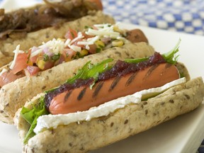 Hotdogs fresh from the grill are a summertime tradition. (Debra Brash/ Victoria Times Colonist)