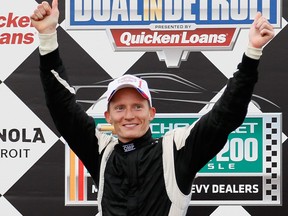 England's Mike Conway, driver of the #18 Dale Coyne Racing Honda, celebrates winning the IZOD IndyCar Series Chevrolet Indy Dual in Detroit at the Raceway at Belle Isle Park in Detroit. (Photo by Kevin C. Cox/Getty Images)