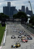 Mike Conway leads drivers into turn one during a restart of the first of two IndyCar Detroit Grand Prix auto races on Belle Isle in Detroit Saturday. (AP Photo/Paul Sancya)