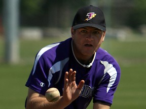 Tecumseh Thunders pitcher Andrew Cooper practises at Lacasse Park in Tecumseh.(TYLER BROWNBRIDGE/The Windsor Star)