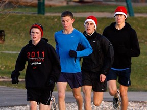 Windsor Legion runners Brandon Allen, from left, Ryan Sleiman, Danny Piticariu and Corey Bellemore work out at Malden Park in 2011. (NICK BRANCACCIO/The Windsor Star)
