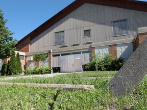 The boarded up Adstoll Arena is shown, June 3, 2013, in Windsor, Ont. A developer is planning on knocking it down and building a condo complex.  (DAN JANISSE/The Windsor Star)