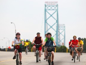 Bike the Bridge participants ride through Canadian customs as they prepare to cross the Ambassador Bridge in this June 2012 file photo. (Dax Melmer / The Windsor Star)