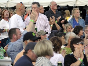 In this file photo, attendees at Carrousel of the Nations applaud following a performance by Alexander Zonjic and Motor City Horns Saturday, June 8 at Riverfront Festival Plaza. (Photo by/Rob Benneian)