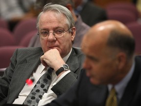 John Dignan, owner of Showstops Inc, left,  and his lawyer Rodney Godard address city council Tuesday, June 4, 2013, in Windsor, Ont.  (DAN JANISSE/The Windsor Star)