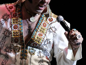 Elvis tribute artist Bruno Nesci performs on stage at the Chrysler Theatre during the opening day of King Fest in Windsor on Friday, June 21, 2013. Money raised at the event goes to the Centre for Seniors.               (TYLER BROWNBRIDGE/The Windsor Star)