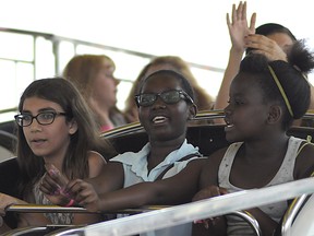 A group of people enjoys a ride at Summerfest at the Riverfront Festival Plaza Saturday, June 15. (ROB BENNEIAN/Special to The Star)