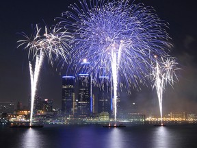 The 55th annual Ford Fireworks presented by Target light up the sky along the Detroit River between Detroit, Michigan and Windsor, Ontario on Monday, June 24, 2013. Thousands turned out and packed the riverfront for the annual event.                (TYLER BROWNBRIDGE/The Windsor Star)