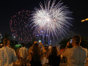 The 55th annual Ford Fireworks presented by Target light up the sky along the Detroit River between Detroit, Michigan and Windsor, Ontario on Monday, June 24, 2013. Thousands turned out and packed the riverfront for the annual event.                (TYLER BROWNBRIDGE/The Windsor Star)