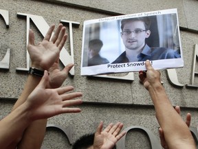 Support is growing for Edward Snowden, a former CIA employee who leaked top-secret information about U.S. surveillance programs. (AP Photo/Kin Cheung)