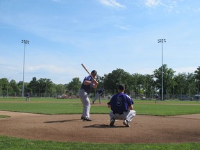 Members of the Tecumseh Thunder junior baseball team practice in the renovated Lacasse park on Wednesday, June 5, 2013.