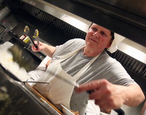 Debra Delaurier, owner and head chef of St. Joachim Diner in St. Joachim, works in the kitchen. TV crews from the Food Network's You Gotta Eat Here! plans to tape segments later this month at two busy county eateries, the St. Joachim Diner in St. Joachim and Kingsville’s Jack’s Gastro Pub & Inn. (Windsor Star files)