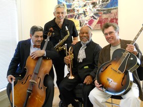 Members of the Speakeasy Trio — Mike Karoub, left, Ray Manzerolle and Hugh Leal, right — with Detroit trumpeter Marcus Belgrave.
The Speakeasy Trio expanded to the Speakeasy Quartet when pianist Mike Karloff joined the band.