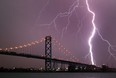 Lightning strikes near the Ambassador bridge in Detroit, Michigan in this file photo.    (Jason Kryk/The Windsor Star)