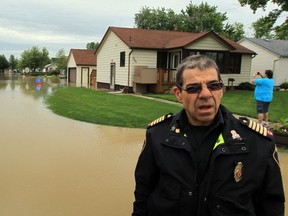 Essex Fire Chief Ed PIllon talks about the flood in McGregor, Ontario on June 13, 2013. (JASON KRYK/The Windsor Star)