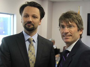 Ambassador of the Republic of Macedonia Ljuben Tedovski, left, and Windsor-Essex Regional Chamber of Commerce president and CEO Matt Marchand during business meeting in Windsor, Ontario on June 3, 2013.  (JASON KRYK/The Windsor Star)