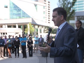 NDP MP Brian Masse (Windsor West), addresses a crowd of about 200 people who rallied Friday, June 14, 2013 at Charles Clark Square to support Bill C-290. (DYLAN KRISTY/The Windsor Star)